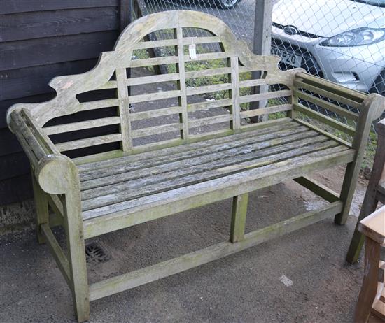 A Lutyens style weathered teak garden bench, W.166cm